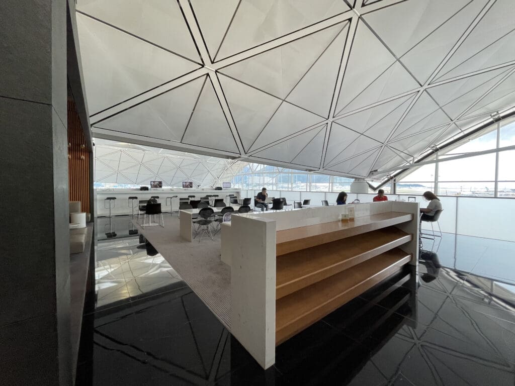 a white and black room with a white ceiling and a white counter