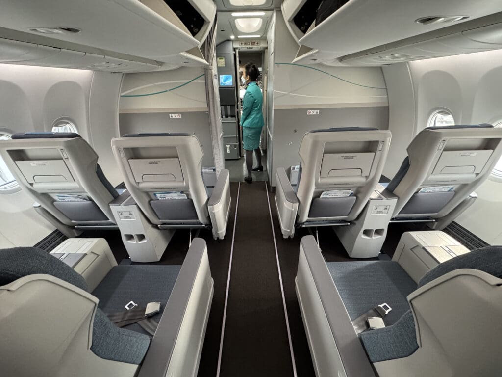 a person standing in the middle of an airplane