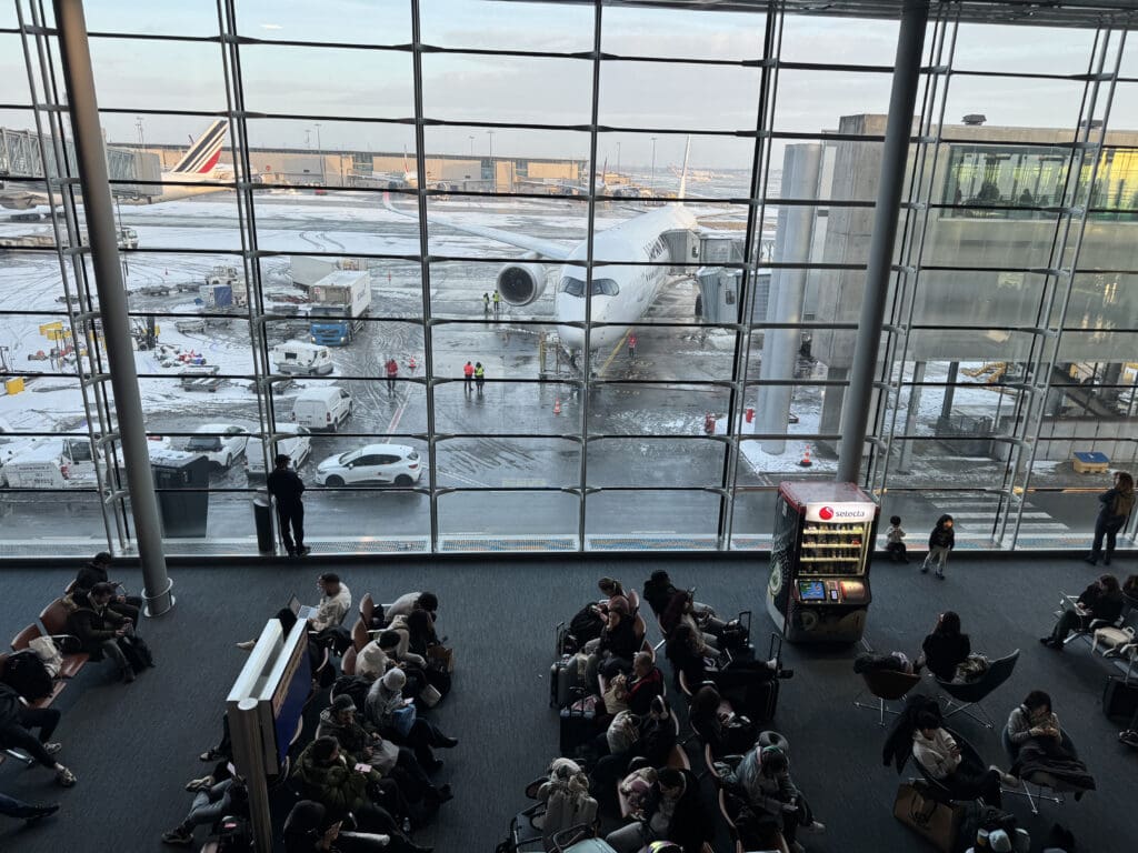 a group of people sitting in a terminal