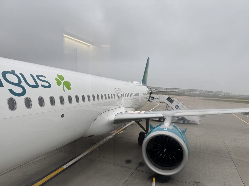 a white airplane on a runway