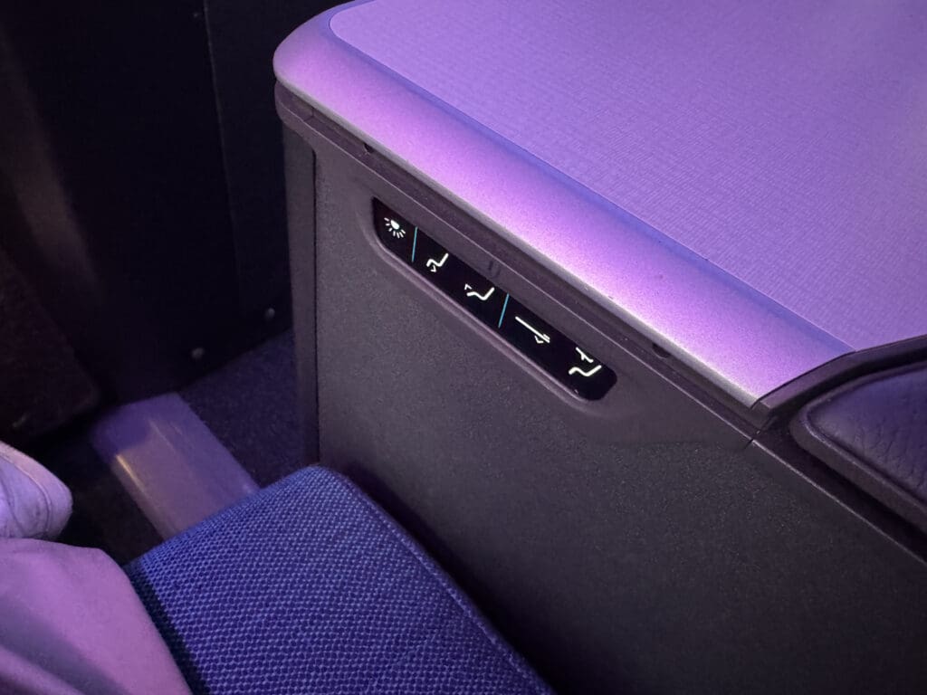 a seat with lights and seats in the back
