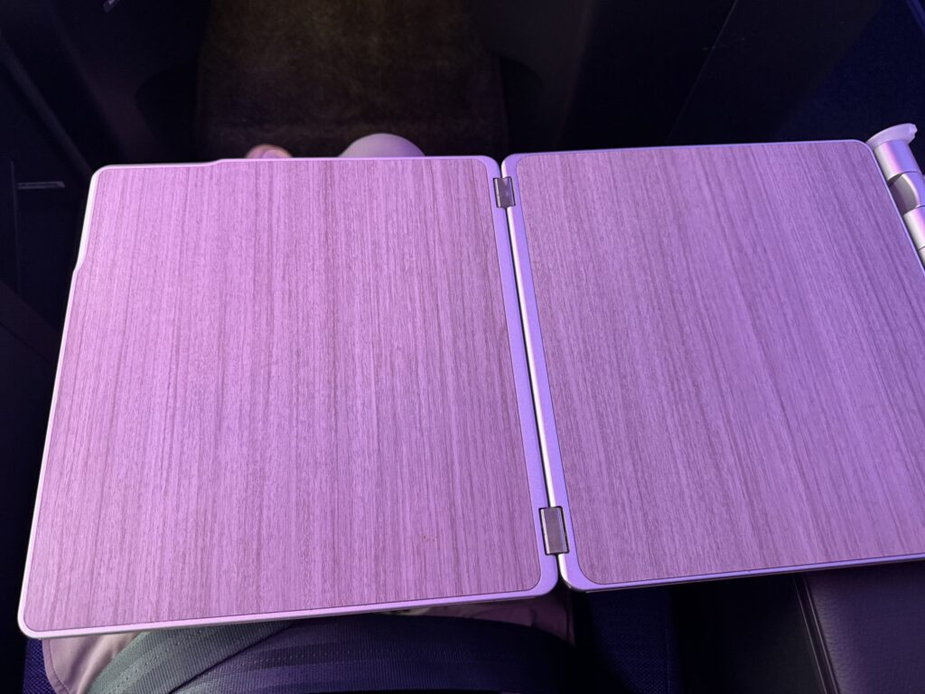a purple rectangular object with a wood grain pattern