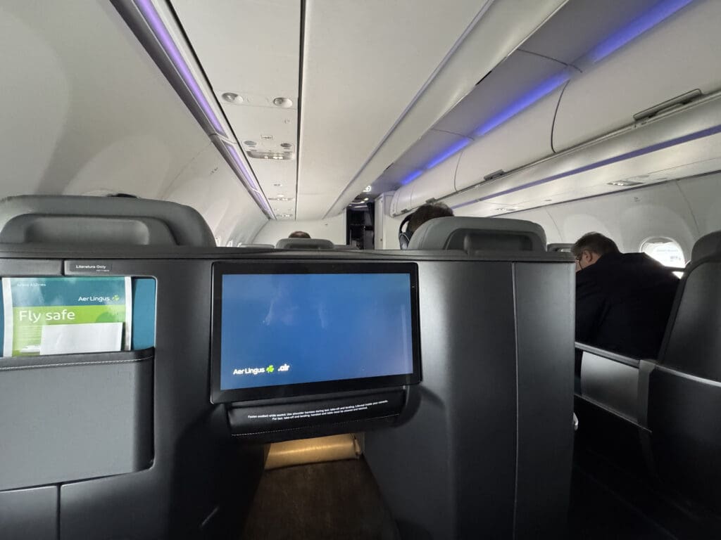 a tv screen on an airplane