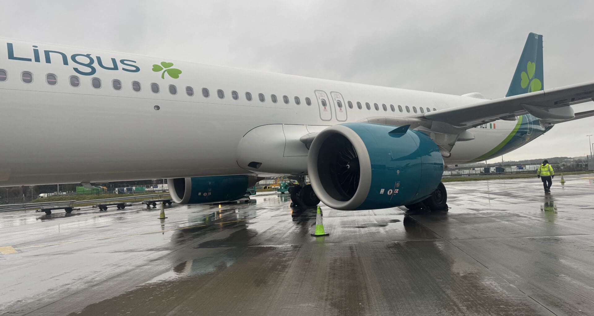 a large airplane on a wet runway