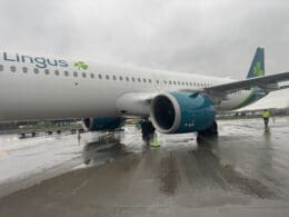 a large airplane on a wet runway