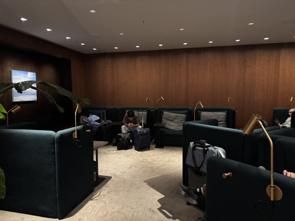 a room with chairs and a person sitting on it