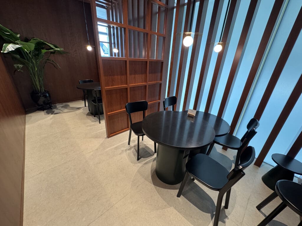 a room with a table and chairs