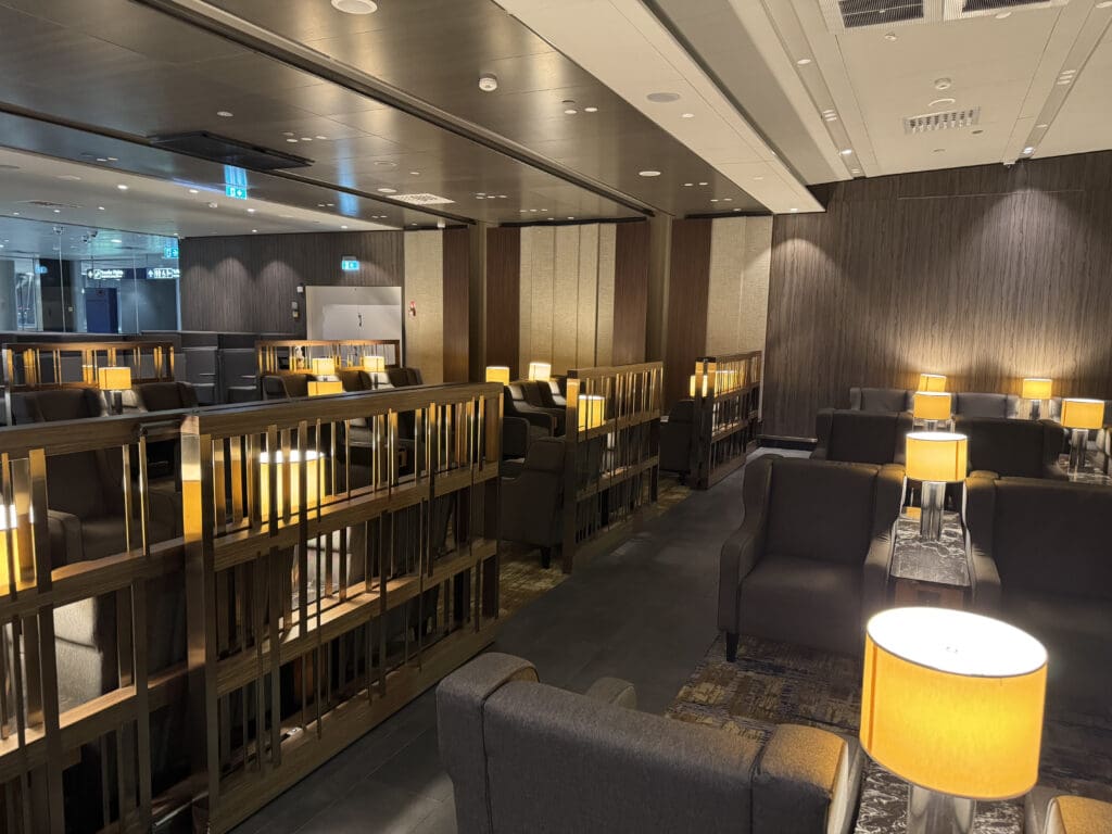 a room with chairs and a railing