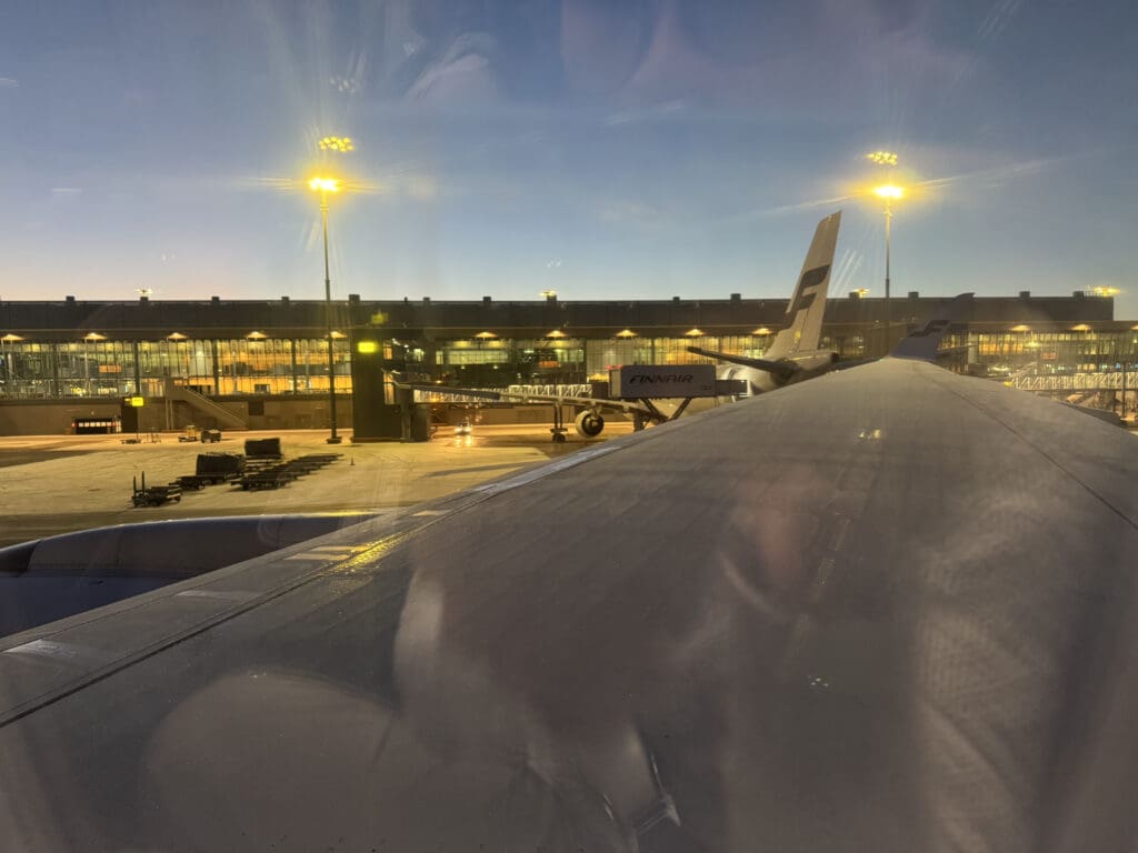 an airplane wing at an airport