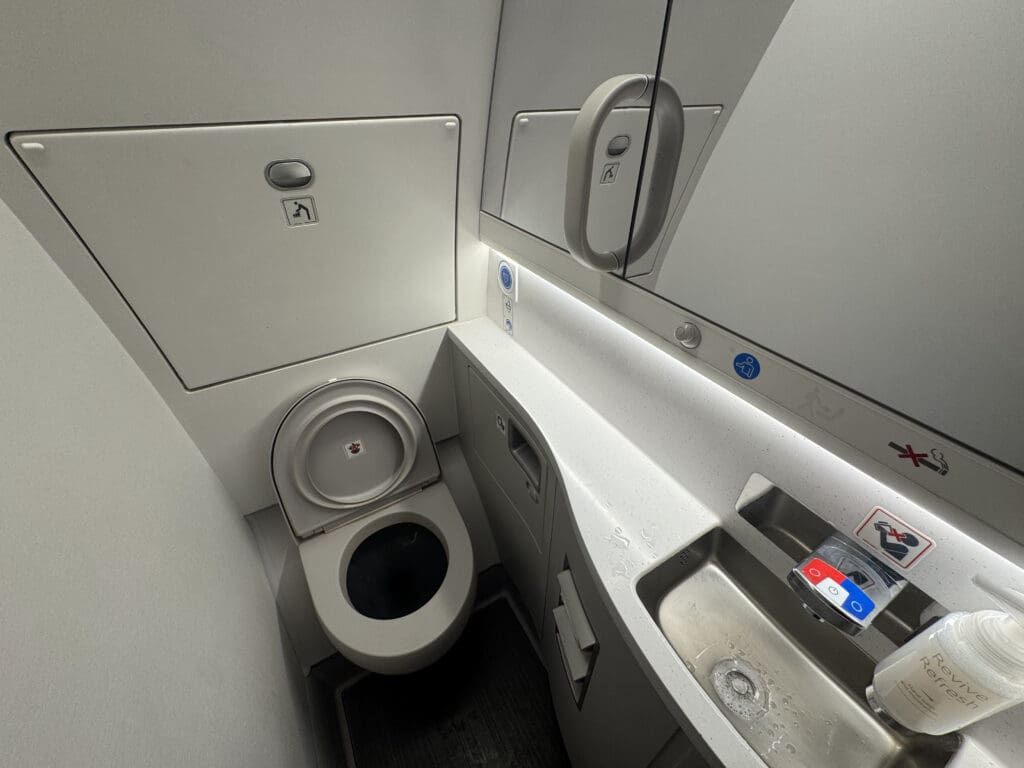 a toilet and sink in a bathroom