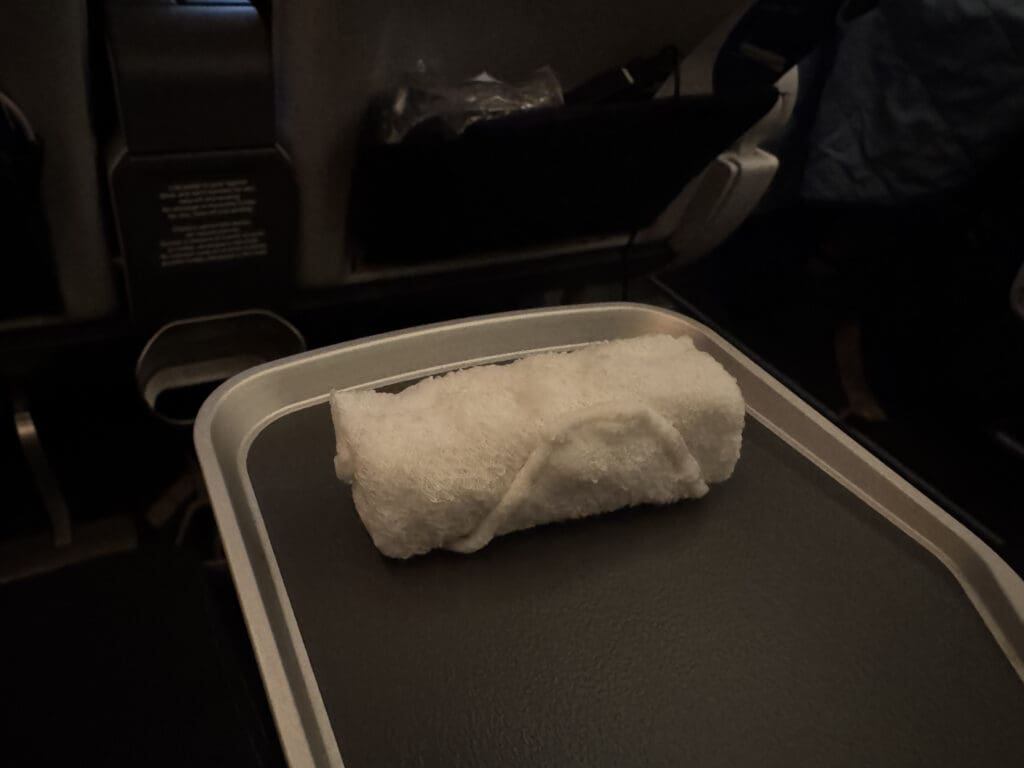 a white towel on a tray