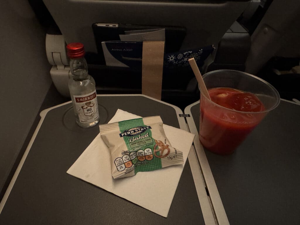 a drink and a glass on a table