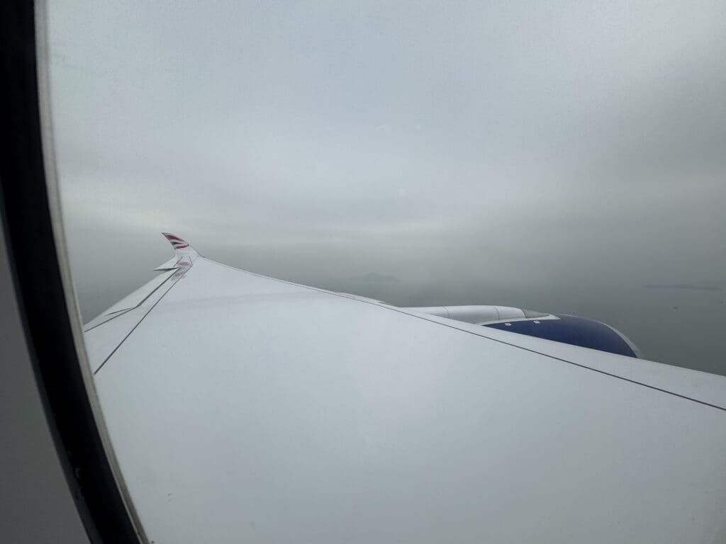 an airplane wing in the sky