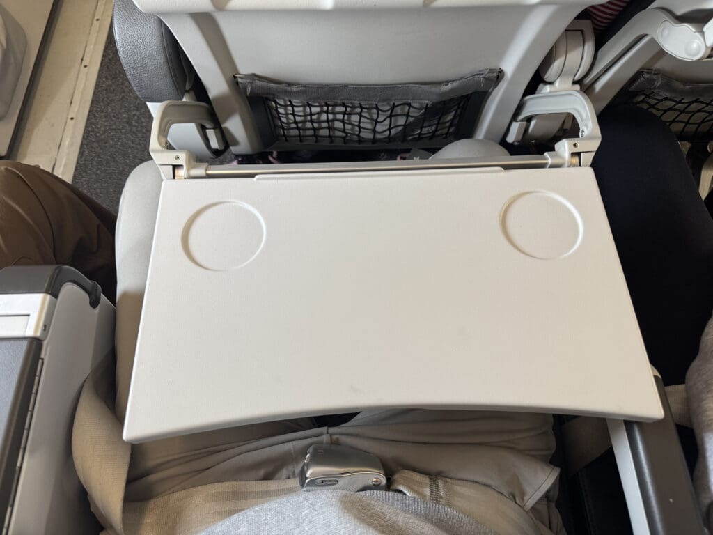 a white tray on a seat