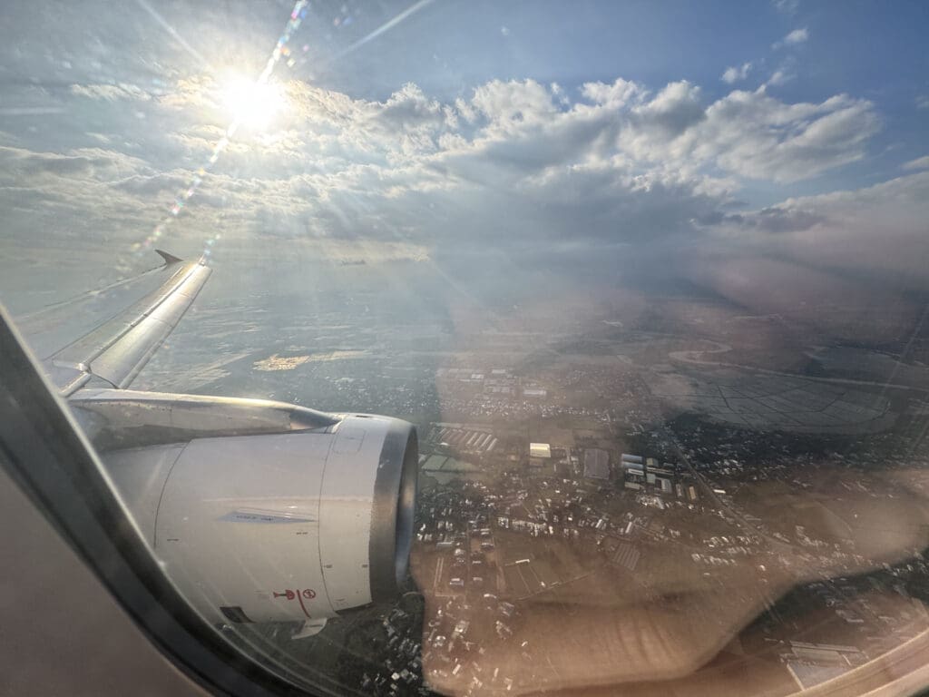 a view of the sun from an airplane window