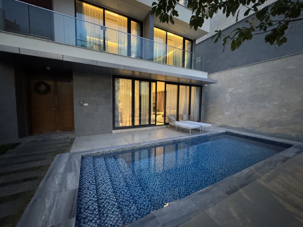 a pool in front of a building