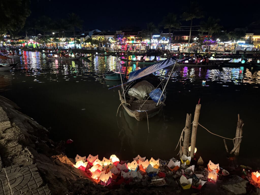 a boat in the water at night