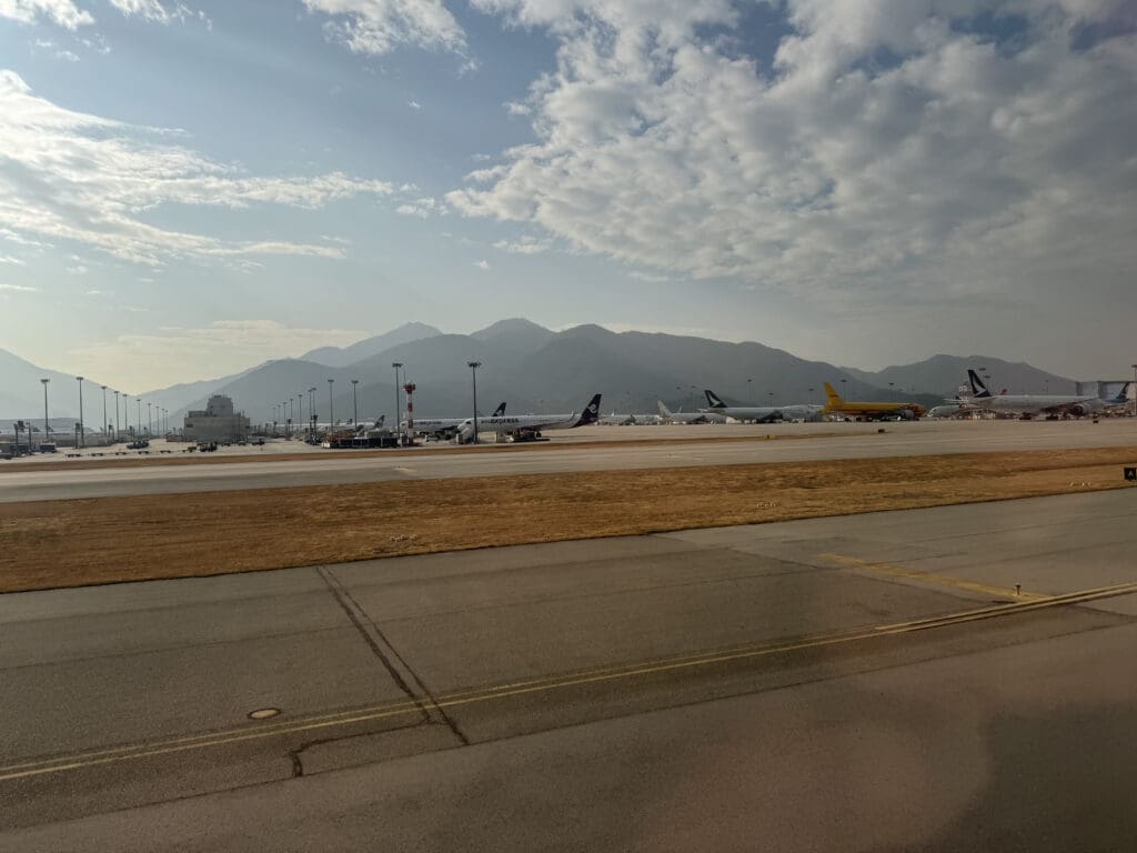 a runway with airplanes on it