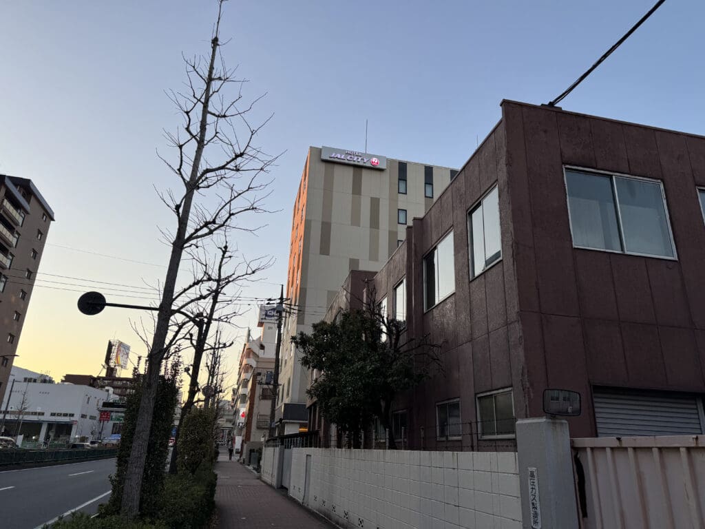 a street with buildings and trees