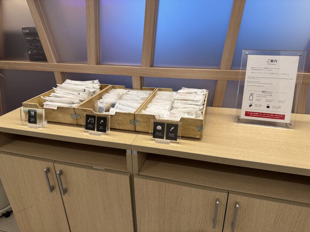 a wooden box with white packets on a table