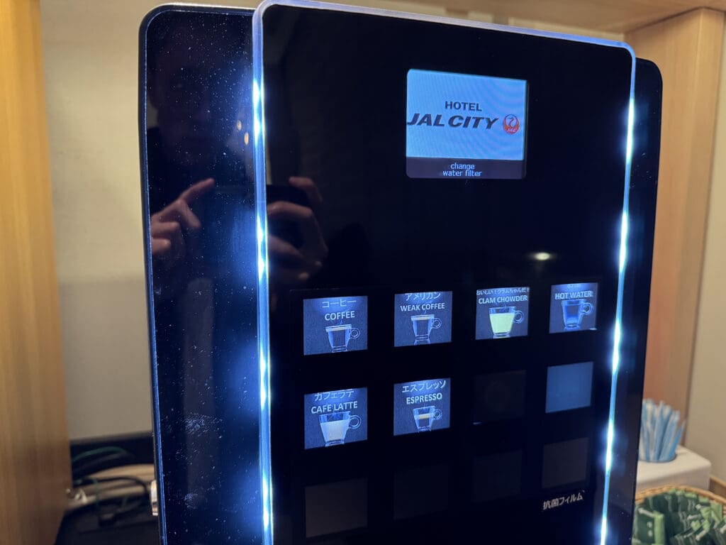 a black rectangular object with a screen and buttons