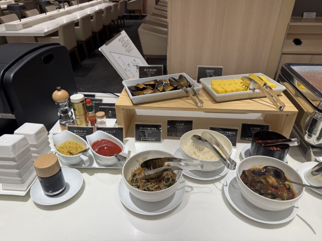 a table with bowls of food on it