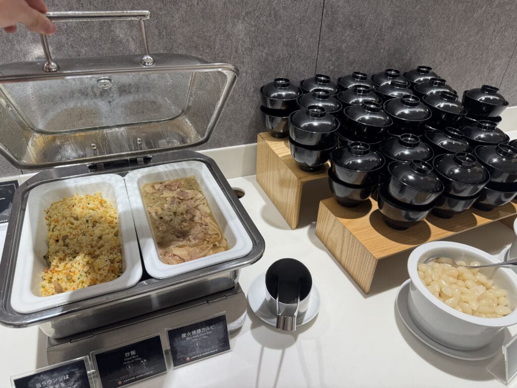 food in containers on a counter