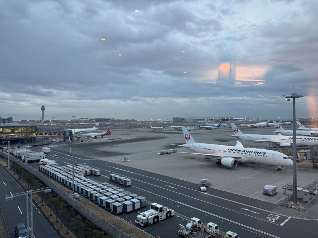 an airport with airplanes parked on the runway