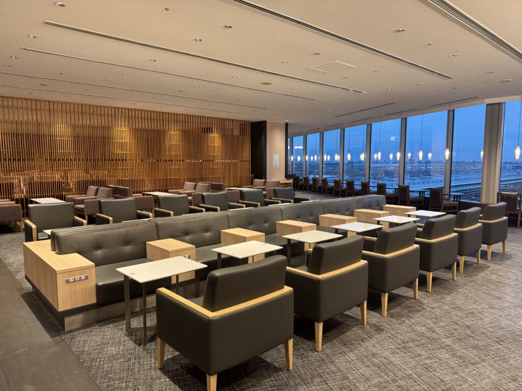 a room with many chairs and tables