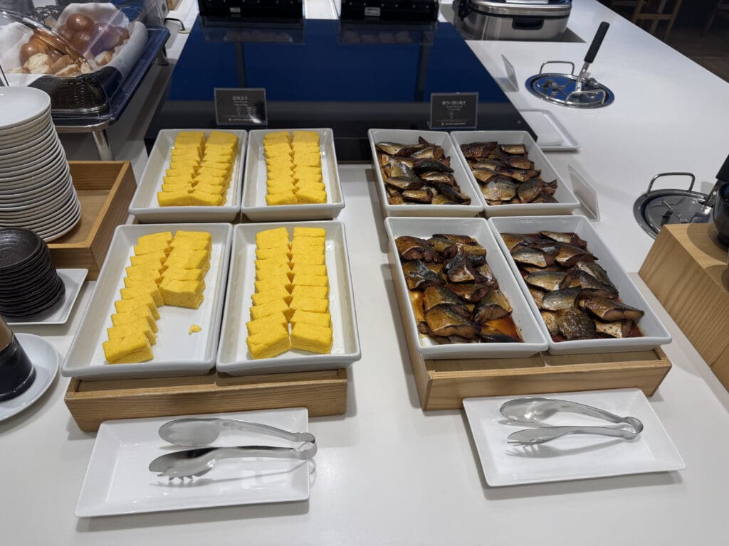 a table with trays of food