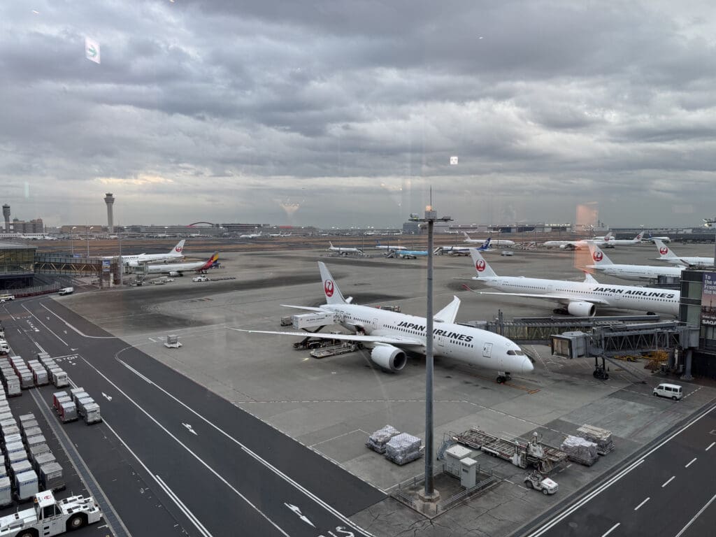 an airport with airplanes parked on the ground