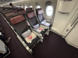 a row of chairs in an airplane