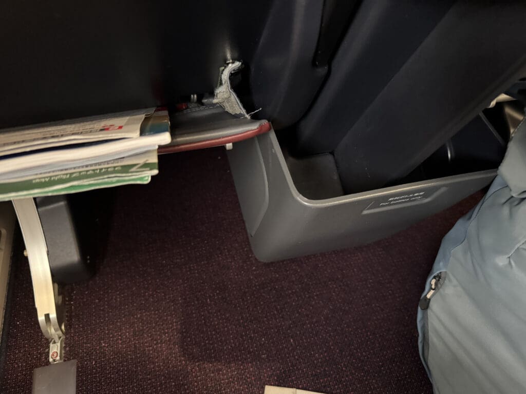 a trash can in a plane