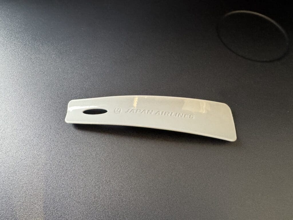 a white object on a black surface