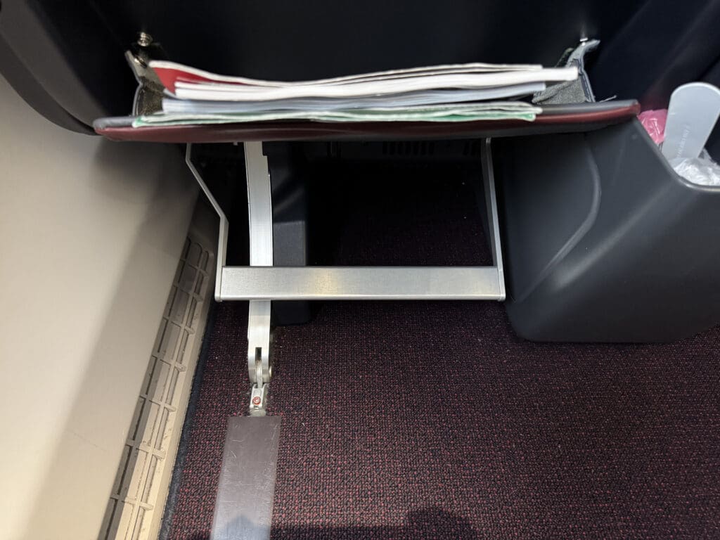 a paper holder in a seat