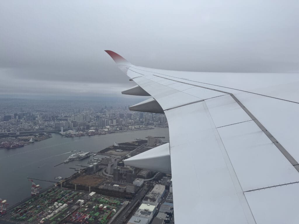 an airplane wing in the sky