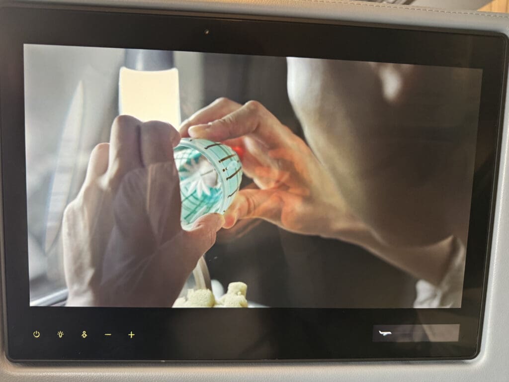 a person holding a plastic cup