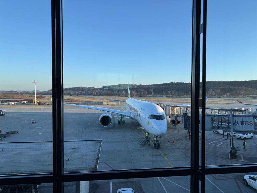 an airplane parked on a tarmac