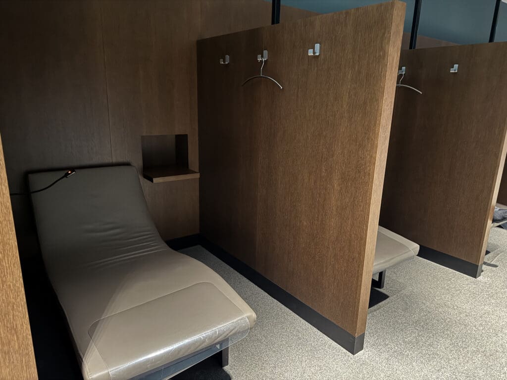 a room with a chair and a wall