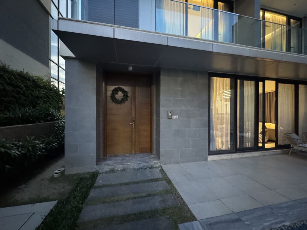 a building with a door and a balcony