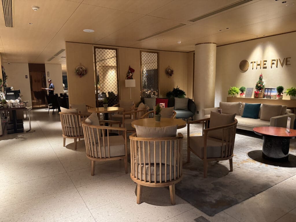 a room with a round table and chairs