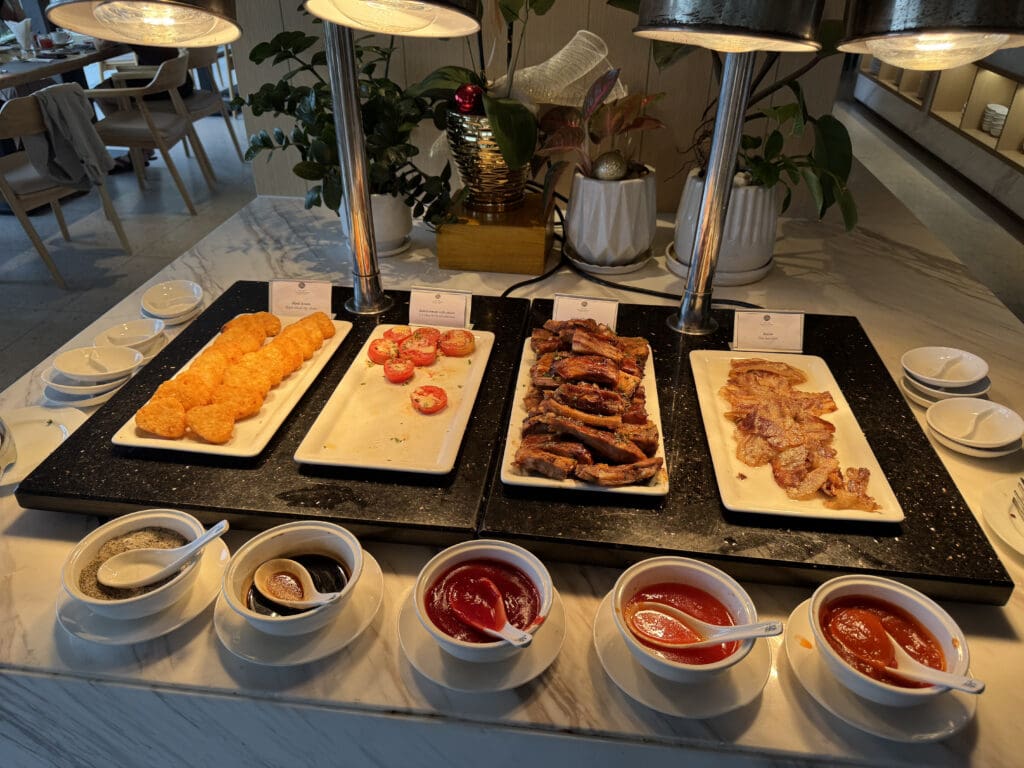 a buffet with different foods on it