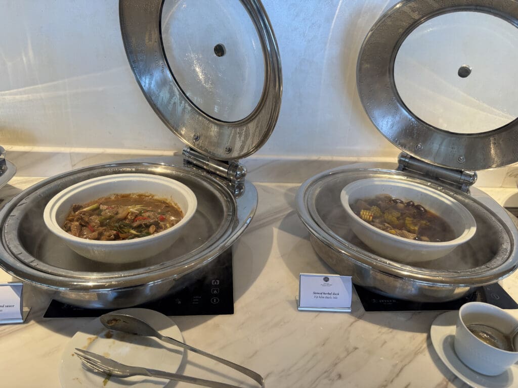 a two bowls of food in a restaurant