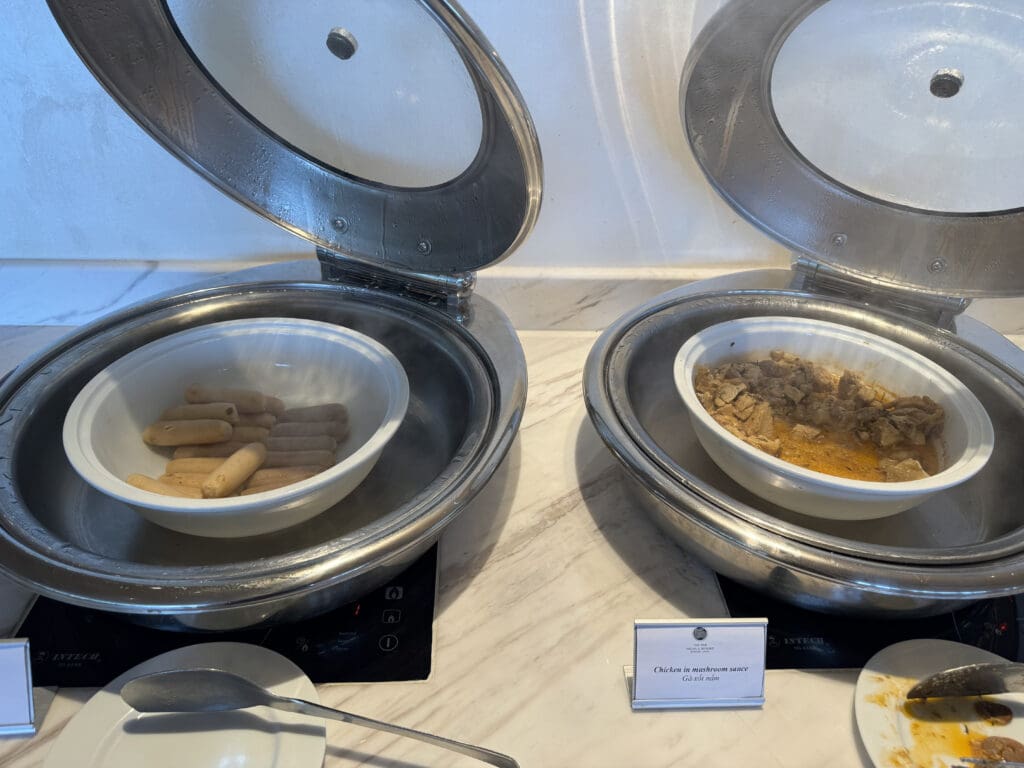 a group of bowls of food in a container