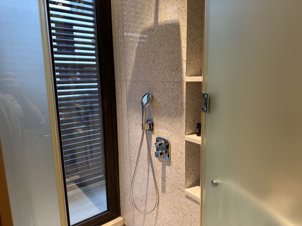 a shower head and shower head on a wall