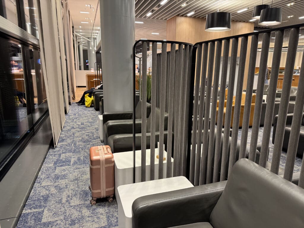 a room with chairs and a railing