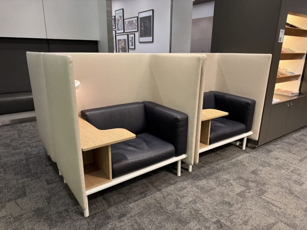 a booth with a table and chairs