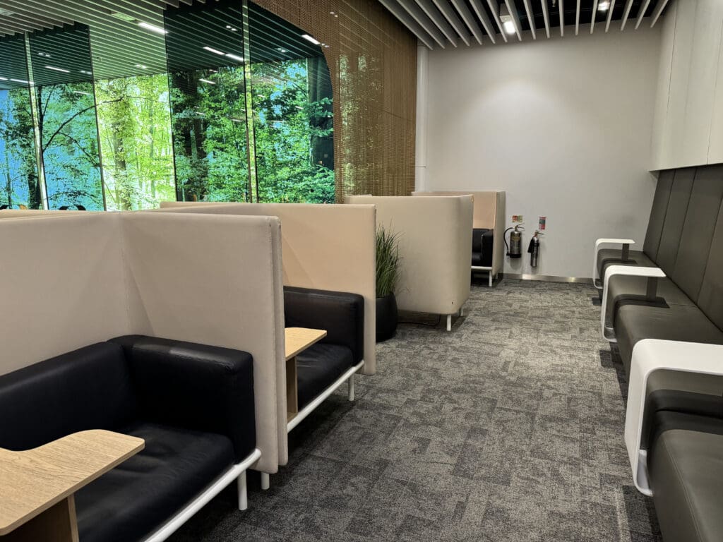 a room with couches and tables