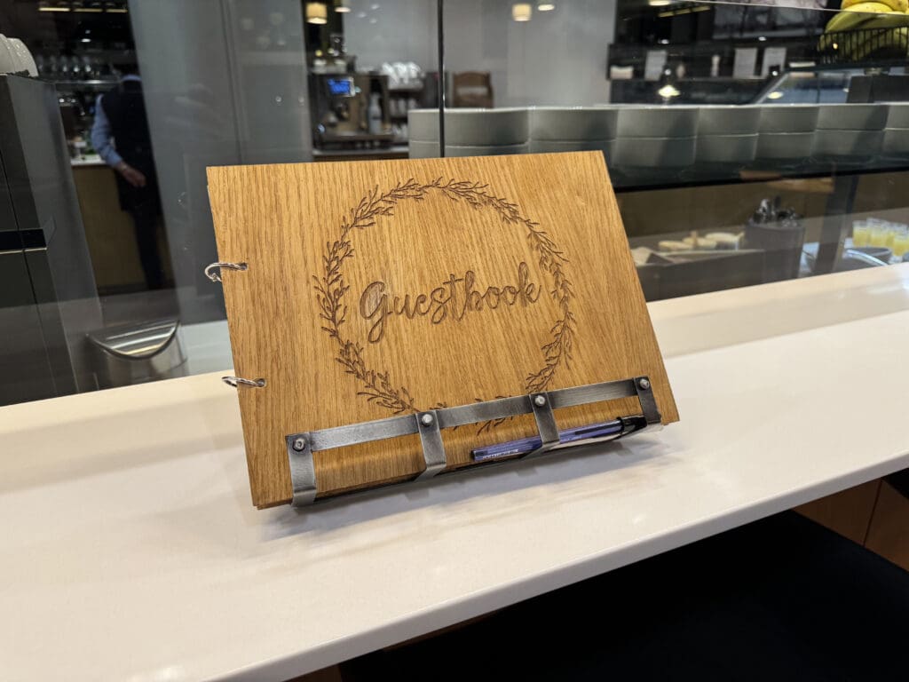 a wood menu holder on a counter