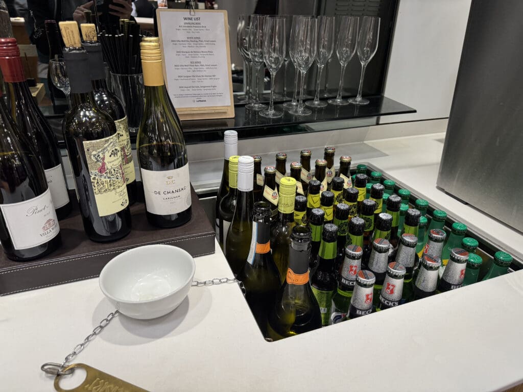 a group of bottles and glasses on a counter